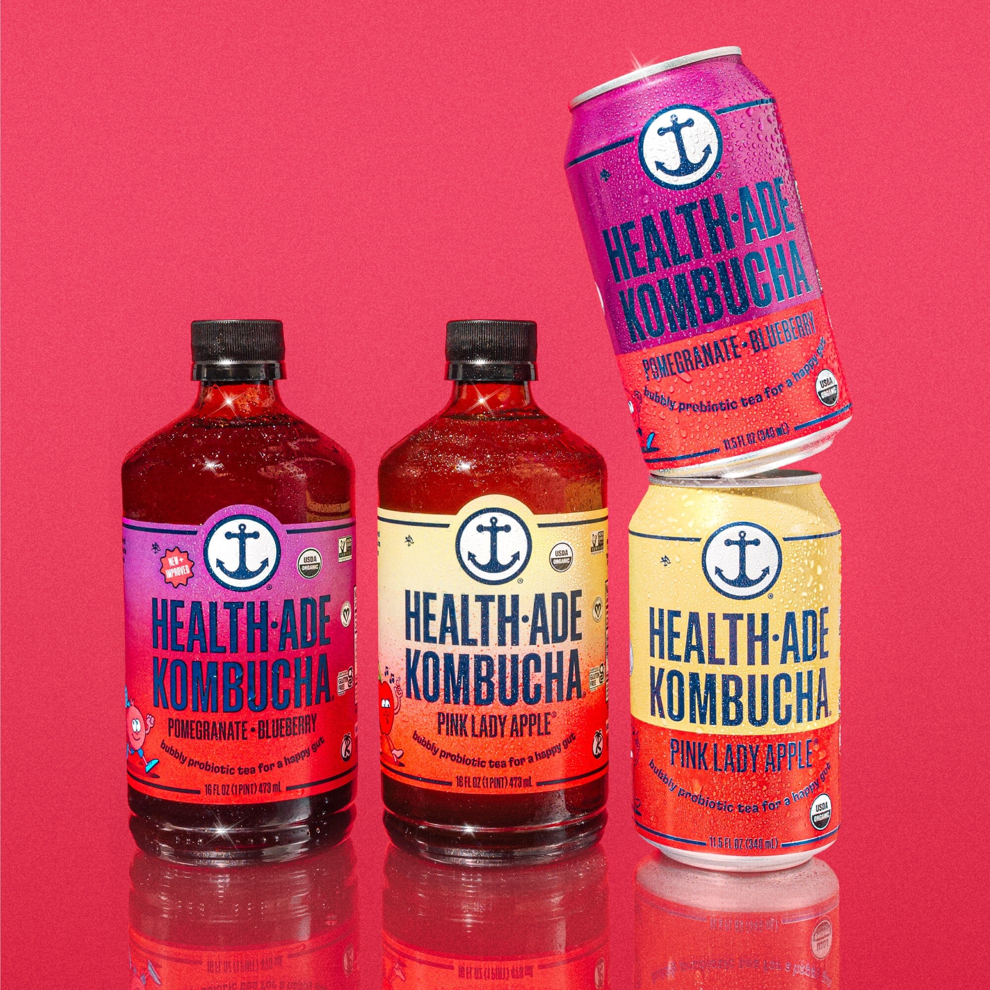 Health-Ade Pomegranate Blueberry Kombucha cans lifestyle image