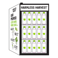 Harmless Harvest All Star countertop cooler holding 36 x 16oz coconut water bottles